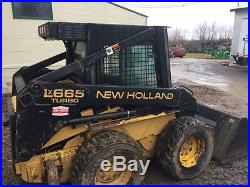 1997 New Holland LX665 Skid Steer Loader