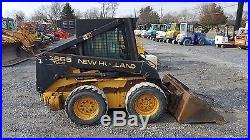 1997 New Holland LX665 Skid Steer Loader with Cab