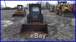 1997 New Holland LX665 Skid Steer Loader with Cab