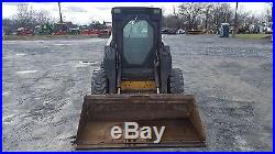 1997 New Holland LX885 Skid Steer Loader with Cab