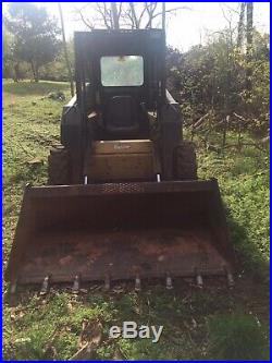 1999 New Holland LX665 Skid Steer With Grapple And Extra Wheels