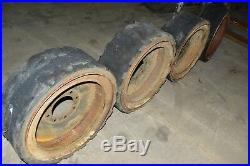 (4) Bobcat Wheels Solid Rubber Tires 23 Rims Skidsteer Case New Holland Gehl