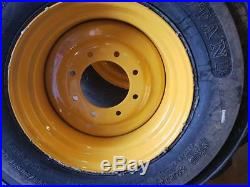 (4- Tires with Wheels) New Holland LS skid-steer tire size 14-17.5 14175