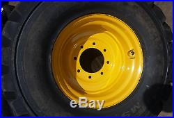 (4- Tires with Wheels) New Holland LS skid-steer tire size 14-17.5 L5 14175