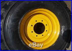 (4- Tires with Wheels) New Holland LS skid-steer tire size 14-17.5 L5 14175