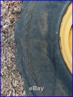 4 Used 14-17.5 FOAM FILLED Skid Steer Tires & Rims for New Holland- Flat proof