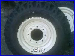4 skid steer tire snow plowing tires and wheels, fits Bobcat, New Holland, Case