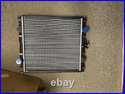 Ford/New Holland Skid-steer Radiator OEM # 87033479 -219998 Northern Radiator