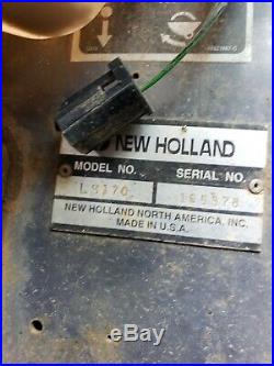 New Holland LS170 skid steer 1,700 hrs heated cab. Runs well
