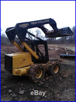 New Holland LX885 Skid steer loader. Tracks Available. Solid Rubber Tires