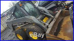 New holland skid steer with attachments