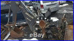 New holland skid steer with attachments